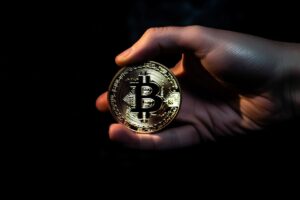 Hand Holding Bitcoin