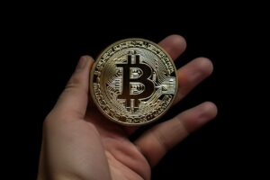 Hand Holding Bitcoin