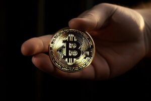 Hand Holding Bitcoin