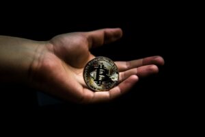 Hand Holding Bitcoin
