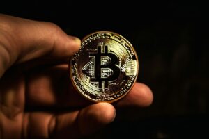 Hand Holding Bitcoin