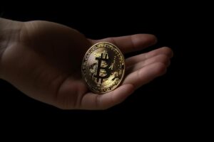 Hand Holding Bitcoin