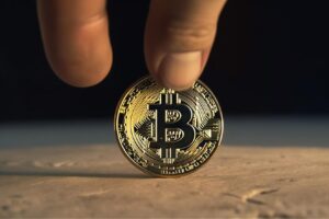 Hand Holding Bitcoin