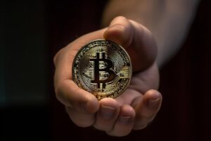 Hand Holding Bitcoin