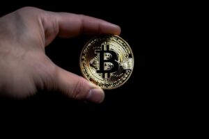 Hand Holding Bitcoin