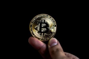 Hand Holding Bitcoin