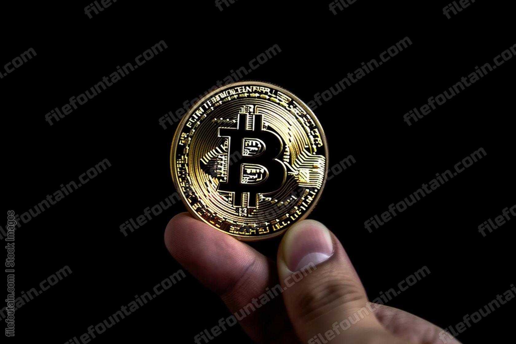 Hand Holding Bitcoin