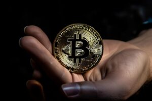 Hand Holding Bitcoin