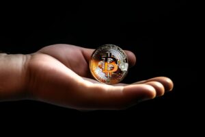 Hand Holding Bitcoin