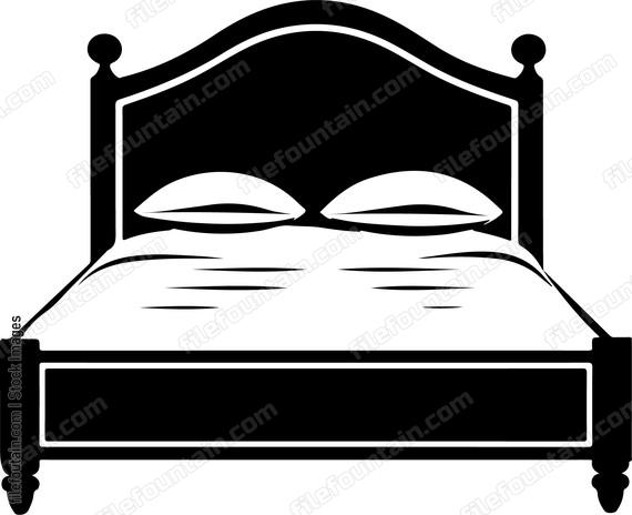 A simple bed frame with pillows