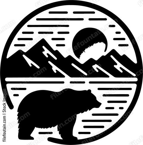 Bear silhouette against a golden sunset in the mountains