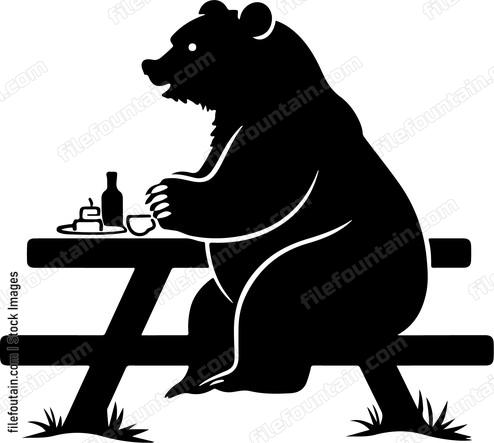 Bear Sitting At Picnic Table