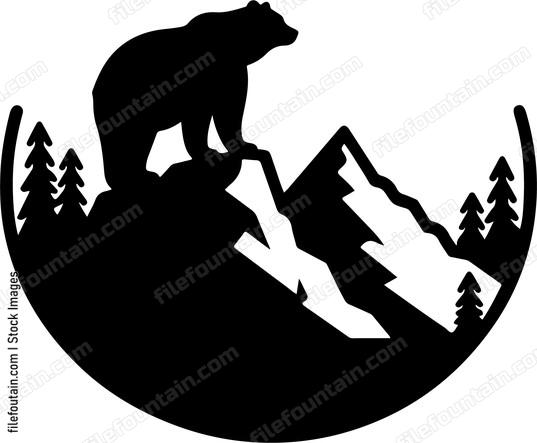 Bear standing tall on a rocky mountain peak