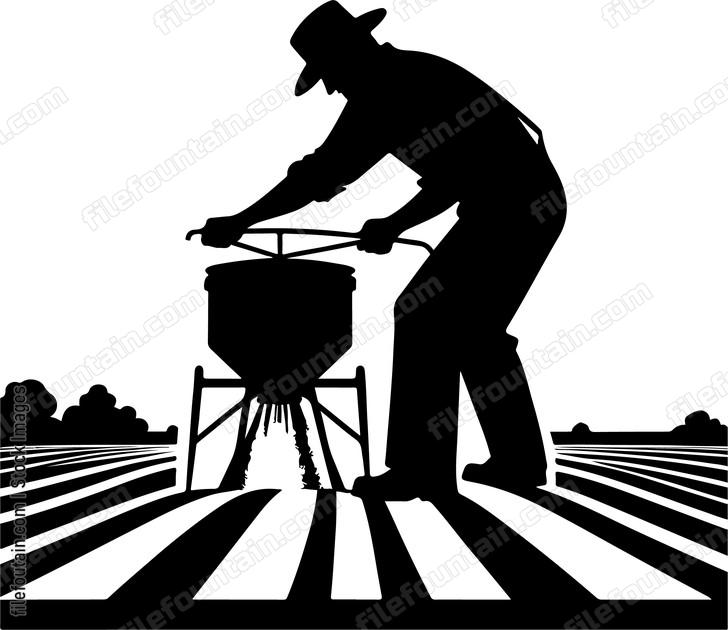 Farmer spreading fertilizer evenly across a field