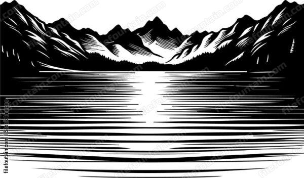 Lake at night with the silhouette of mountains in the background