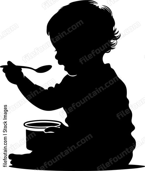 toddler attempting to feed himself with a spoon