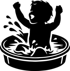 toddler splashing joyfully in a kiddie pool