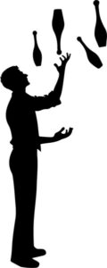 Jugglers skillfully keeping multiple objects in the air