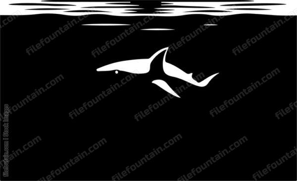 Shark swimming a in dark ocean