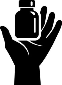 Medicine Bottle In Hand