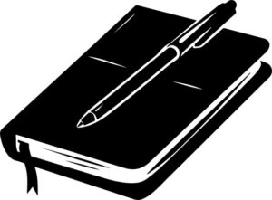 pen on top of notebook